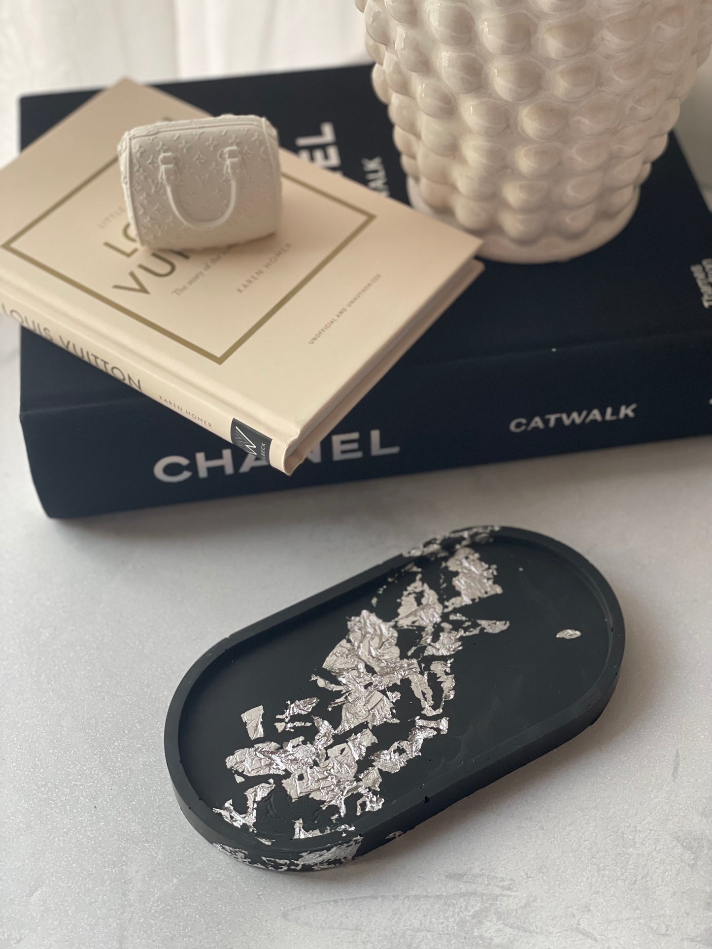 Black tray with silver elements